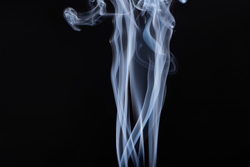 abstract white flowing smoke on black background