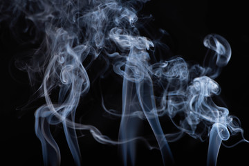 abstract white flowing smoke on black background