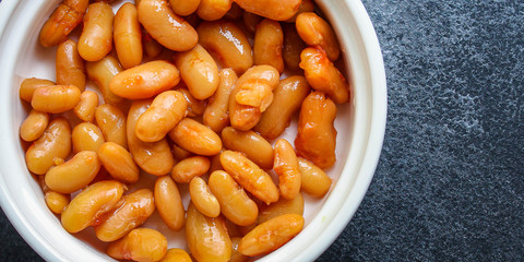 beans in tomato sauce,
keto or paleo diet
menu concept food background. top view. copy spaces for text