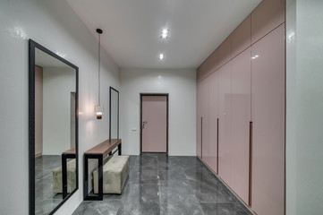 Interior of a modern loft style apartment. Spacious hallway