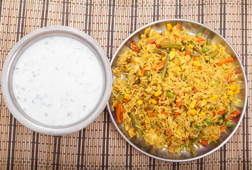 Plate of basmati rice with yogurt