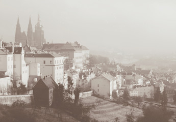 Romantic view on Praga from above. Sepia toned card in vintage retro style