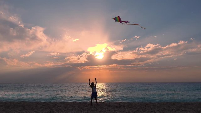 Kid Playing on Beach on Seashore, Child Flying Kite at Sunset on Ocean, Happy Little Girl on Coastline