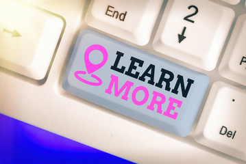Conceptual hand writing showing Learn More. Concept meaning knowledge or skill acquired by...