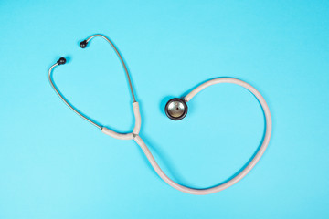 Stethoscope. Medical equipment. Healthcare and surgical concept. On a blue background