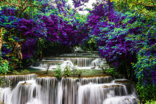 amazing of huay mae kamin waterfall in colorful autumn forest at Kanchanaburi, thailand © Meawstory15Studio