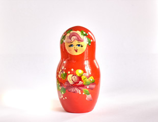 red matryoshka on white background