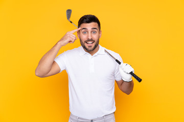 Golfer player man over isolated yellow background intending to realizes the solution