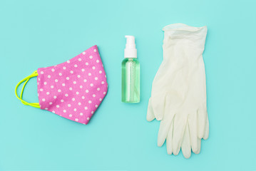 diy fabric face masks. medical gloves and sanitizer in bottle