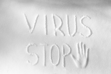 white snow texture. inscription - stop the virus