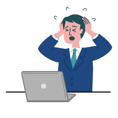 スーツ　男性　パソコン　焦っている