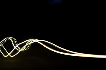 Abstract glowing light trails