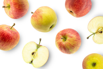 Ripe red apples with slices isolated on white background top view. Flat lay pattern