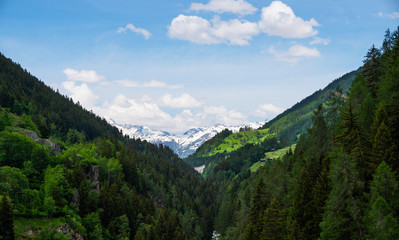 Fototapeta na wymiar Panoramic view to the mountains. Snow covered Alps mountains on background. Switzerland, Europe.