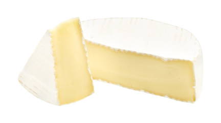 Camembert or brie cheese isolated on white background. Soft cheese covered with edible white mold view from above.