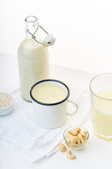 Cashew milk and rice milk. Healthy vegan beverage, protein source. Dairy alternative for lactose intolerance