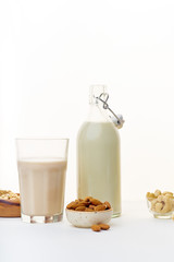 Oat milk and almond milk. Vegan beverage full of proteins. Healthy dairy alternative for lactose intolerance