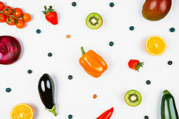 White background with berries, fruits and vegetables.
