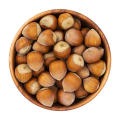 Hazelnuts in a wooden bowl isolated on white background