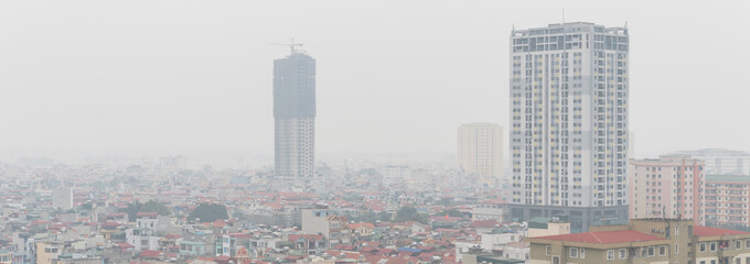 Panoramic top view foggy and misty Hanoi urban landscape causes by air pollution