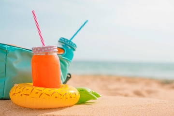 soft drinks at the beach with inflatables