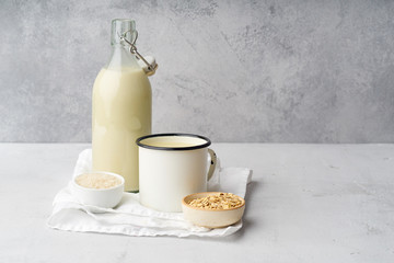 Rice milk and oat milk. Vegan beverage full of proteins. Healthy dairy alternative for lactose intolerance