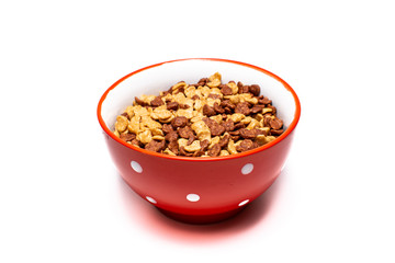 Bowl of cereals on a white background. Photo of healthy food, waiting to be eaten. Space for text