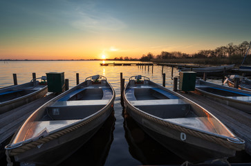 Fototapeta na wymiar Spring dawn at a small marina at a lake in Holland.
