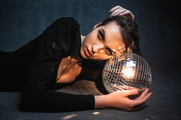 girl with disco ball