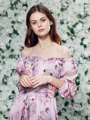 Floral background of a woman in a model dress