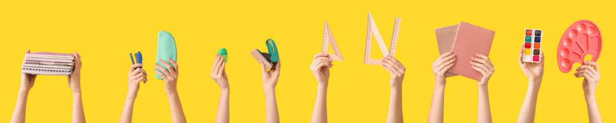 Many hands with school supplies on color background