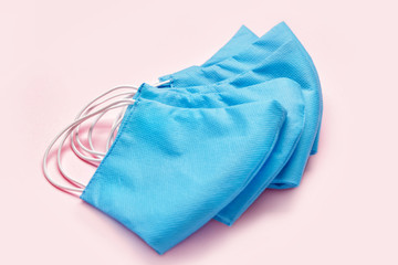 Medical masks on color background