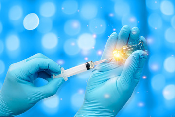 Scientists transparent medical gloves using syring Prepare a trial drug for the vaccine against Covid-19. Scientific and medical concepts