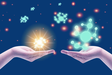 The molecules and Scientific technology concept between hands of a human in light background