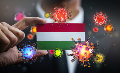 Corona Virus Around Hungary Flag. Concept Pandemic Outbreak in Country