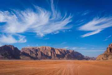 Jebel Rum rock in wadi rum desert, sunny day between wadi rum stones and mountains
