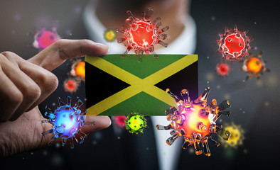 Corona Virus Around Jamaica Flag. Concept Pandemic Outbreak in Country