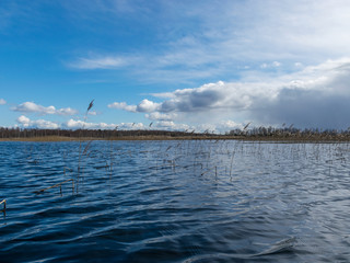 beautiful landscape with lake and sky in backlight