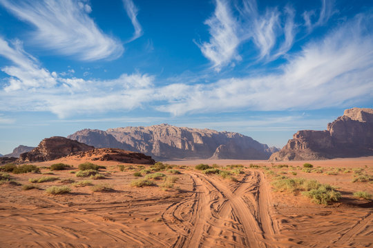 Desert Road In Wadi Rum, Jeep Traces In The Sand