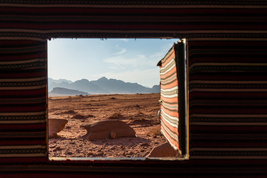 Fototapeta Camp window view in wadi rum, Jordan, View from a tent in the desert, Bedouin tent inside