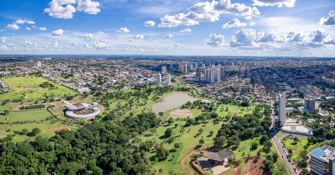Panoramic aerial view of the city of Campo Grande MS, Brazil and the park of the indigenous nations. Big wooded city with a park, lake, green areas and low density buildings.