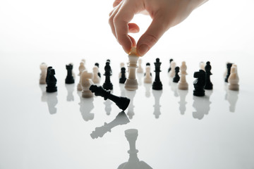 King 's fall in the chess game. Biznets concept. Disposal of the competition