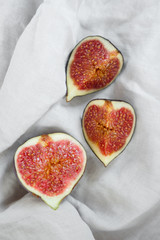 Fresh ripe sliced figs. Healthy mediterranean fig fruit. Fresh figs on white background. 