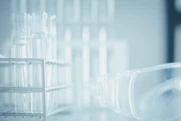 Serum liquid bottle to test tube, laboratory research and development concept. scientist sample chemistry or medicine test. Sampling of covid-19 infectious idea.