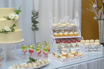 Wedding sweet table with cake and desserts
