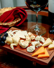 cheese set with glass of wine