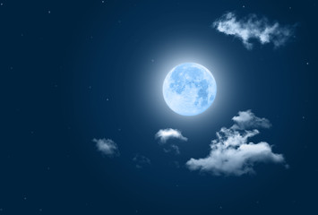 Mystical Night sky background with full moon, clouds and stars