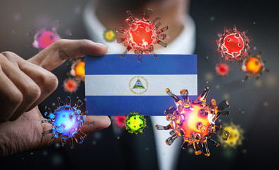 Corona Virus Around Nicaragua Flag. Concept Pandemic Outbreak in Country