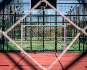 Football soccer goal .Synthetic soccer and basketball field.