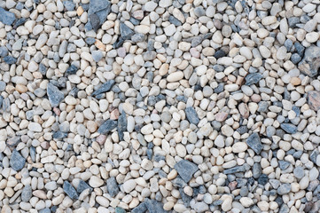 Small rock surface for background and texture, various size of rock on ground.